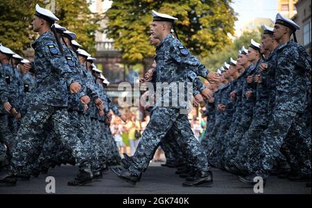 Cadets of the Institute of the Naval Forces march in preparation for a parade celebrating Ukraine’s 30th anniversary of independence at Kyiv, Ukraine, Aug. 20, 2021. Independence Day is the main state holiday in Ukraine, celebrated on Aug. 24 in commemoration of their Declaration of Independence in 1991. Stock Photo