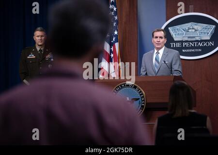 Pentagon Press Secretary John F. Kirby and Army Maj. Gen. William 'Hank' Taylor, Joint Staff deputy director for regional operations, brief the press about Afghanistan, the Pentagon, Washington, D.C., Aug. 21, 2021. Stock Photo