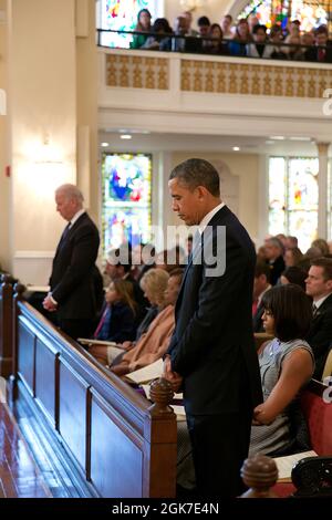 President Barack Obama, First Lady Michelle Obama, Vice President Joe Biden, Dr. Jill Biden, and their families attend an inaugural prayer service at St. John's Church in Washington, D.C., Jan. 21, 2013. (Official White House Photo by Pete Souza) This official White House photograph is being made available only for publication by news organizations and/or for personal use printing by the subject(s) of the photograph. The photograph may not be manipulated in any way and may not be used in commercial or political materials, advertisements, emails, products, promotions that in any way suggests ap Stock Photo