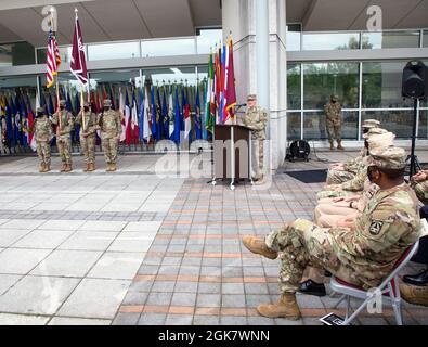 Brig. Gen. Anthony McQueen, commanding general, U.S. Army Medical Research and Development Command and Fort Detrick, Md. delivers remarks during an assumption of command ceremony at the Walter Reed Army Institute of Research, Silver Spring, Md., Aug. 31, 2021. During the ceremony Col. Chad Koenig assumed command of WRAIR. Stock Photo