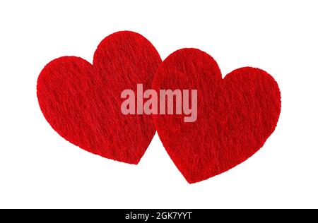 Pair of valentine hearts of red colored felt isolated on a white background. Symbol of love, passion, tenderness. Valentine day design element. Stock Photo