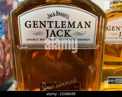 Viersen, Germany - May 9. 2021: Closeup of bottle label Jack Daniels Gentleman whiskey in shelf of german supermarket Stock Photo