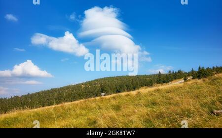 Scenic clouds over Karkonosze Mountains, Karkonosze National Park, Poland. Stock Photo