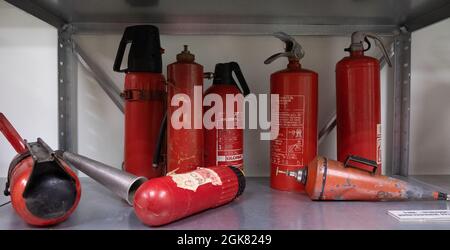Saku, Estonia - 08.20.2020:  Display in the fire museum. Fire extinguishers. Retro collection. Stock Photo