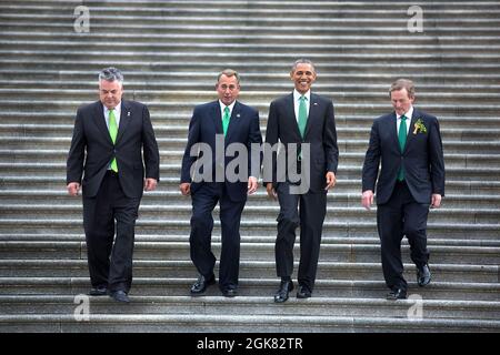 President Barack Obama and Prime Minister (Taoiseach) Enda Kenny of Ireland, right, are escorted by Rep. Peter King, R-N.Y., left, and House Speaker John Boehner as they depart a St. Patrick's Day lunch at the U.S. Capitol in Washington, D.C, March 17, 2015. (Official White House Photo by Lawrence Jackson) This official White House photograph is being made available only for publication by news organizations and/or for personal use printing by the subject(s) of the photograph. The photograph may not be manipulated in any way and may not be used in commercial or political materials, advertiseme Stock Photo