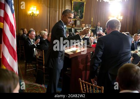 President Barack Obama delivers a toast during a St. Patrick's Day lunch with Prime Minister (Taoiseach) Enda Kenny of Ireland at the U.S. Capitol in Washington, D.C., March 17, 2015. (Official White House Photo by Pete Souza) This official White House photograph is being made available only for publication by news organizations and/or for personal use printing by the subject(s) of the photograph. The photograph may not be manipulated in any way and may not be used in commercial or political materials, advertisements, emails, products, promotions that in any way suggests approval or endorsemen Stock Photo