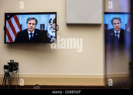 Washington, USA. 13th Sep, 2021. Secretary of State Antony Blinken appears on a television screen as he testifies virtually on the US withdrawal from Afghanistan during a House Foreign Affairs Committee hearing on Capitol Hill in Washington, DC, on September 13, 2021. (Photo by Oliver Contreras/SIPA USA) Credit: Sipa USA/Alamy Live News Stock Photo