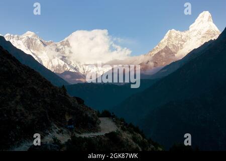 panoramic evening view of Ama Dablam, Mount Everest and Lhotse - way to Everest base camp - Nepal Stock Photo