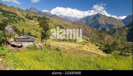 Beautiful village in western Nepal with Dhaulagiri Himal Stock Photo