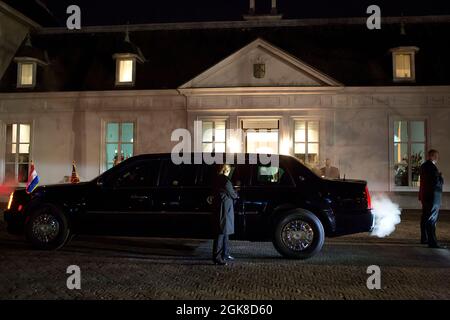 President Barack Obama walks to the motorcade following the G7 Leaders Meeting to discuss the situation in Ukraine, at the Prime Minister's residence in The Hague, the Netherlands, March 24, 2014. (Official White House Photo by Pete Souza) This official White House photograph is being made available only for publication by news organizations and/or for personal use printing by the subject(s) of the photograph. The photograph may not be manipulated in any way and may not be used in commercial or political materials, advertisements, emails, products, promotions that in any way suggests approval Stock Photo
