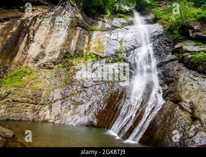 Beautiful Makhuntseti waterfall view in Georgia local attraction nobody Stock Photo