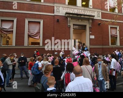 Bologna, Italy. 13th Sep, 2021. Students enter a primary school in Bologna, Italy, on Sept. 13, 2021. Over 3.8 million students across Italy went back to school on Monday. Credit: Gianni Schicchi/Xinhua/Alamy Live News