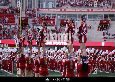 Bloomington, United States. 11th Sep, 2021. Indiana University cheerleaders lead a cheer before IU plays against Idaho during the NCAA football game at Memorial Stadium in Bloomington.The Hoosiers beat the Vandals 56-14. (Photo by Jeremy Hogan/SOPA Images/Sipa USA) Credit: Sipa USA/Alamy Live News Stock Photo