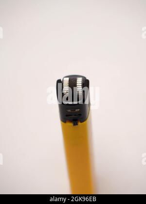 Picture of yellow lighter. Shoot on white isolated background Stock Photo