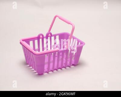 Picture of purple shopping cart. Shoot on white isolated background Stock Photo