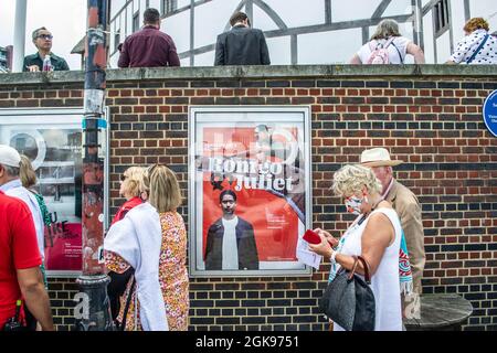 LONDON, ENGLAND- 24 August 2021: Poster for Romeo and Juliet outside of Shakespeare's Globe in London Stock Photo