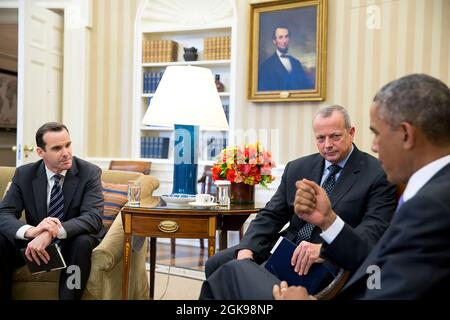 President Barack Obama meets with retired Gen. John Allen, Special Presidential Envoy for the Global Coalition to Counter ISIL and Brett McGurk, Deputy Special Presidential Envoy, left, in the Oval Office, Sept. 16, 2014. (Official White House Photo by Pete Souza) This official White House photograph is being made available only for publication by news organizations and/or for personal use printing by the subject(s) of the photograph. The photograph may not be manipulated in any way and may not be used in commercial or political materials, advertisements, emails, products, promotions that in a Stock Photo