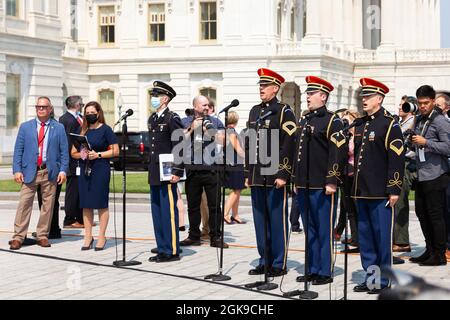Washington DC, USA. 13th Sep 2021. A quartet from the US Army Band sings during a ceremony on the Capitol steps in remembrance of the victims of the September 11th attacks. Credit: Allison Bailey/Alamy Live News Stock Photo