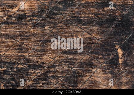 Old burnt scratched wooden texture background Stock Photo