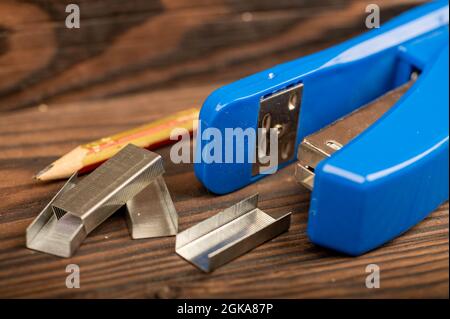 Stationery stapler, stapler staples, close-up selective focus Stock Photo