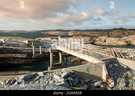 Bridge destroyed by storm at Sotra in Norway. Stock Photo