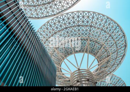 Dubai, UAE, 04/07/20. Modern metal light structures in flower/tree shape with blue sky background, Bluewaters Island new artificial district in Dubai. Stock Photo