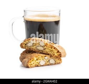 Italian cantuccini cookies and coffee cup. Sweet dried biscuits with almonds isolated on white background. Stock Photo