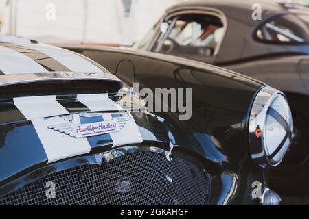 Italy, september 12 2021. Vallelunga classic. Austin Healey 100-4 racing vintage car hood detail with logo and name Stock Photo