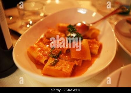 Close up Paccheri pasta in bolognese sauce Stock Photo