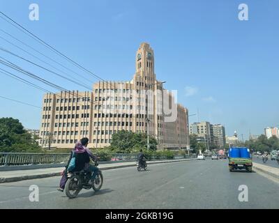 The EFU insurance head office building next to Karachi Port Trust Tower Stock Photo