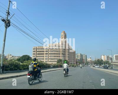 The EFU insurance head office building next to Karachi Port Trust Tower Stock Photo