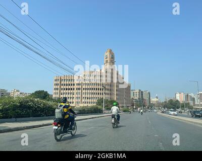 The EFU insurance head office building next to Karachi Port Trust Tower Stock Photo