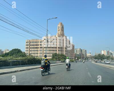 The EFU insurance head office building next to Karachi Port Trust Tower Stock Photo