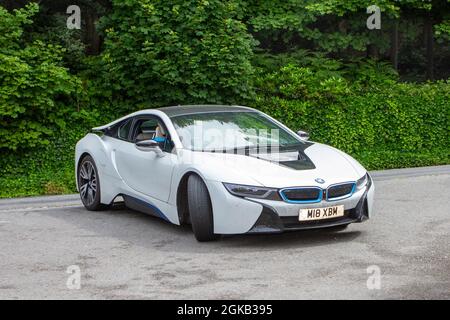 2014 white BMW i8 6 speed automatic 1499cc Hybrid Electric  en-route KLMC at ‘The Cars the Star Show” in Holker Hall & Gardens, Grange-over-Sands, UK Stock Photo