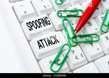 Writing displaying text Spoofing Attack. Business approach impersonation of a user, device or client on the Internet Internet Browsing And Online Stock Photo