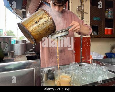 Traditional Pathan’s chai cafe in a market place in Karachi. Chai Dhaba. know as tea hotel Stock Photo