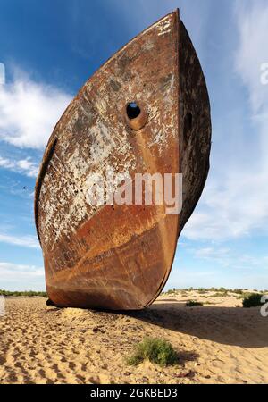 Boats in desert around Moynaq, Muynak or Moynoq - Aral sea or Aral lake - Uzbekistan - asia Stock Photo