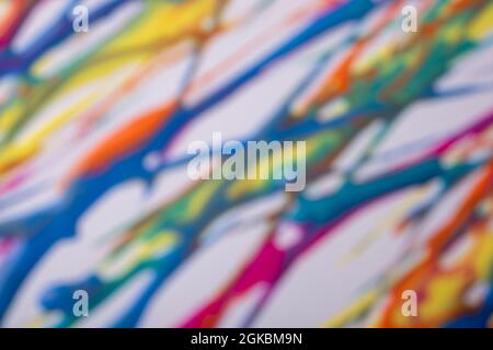 Blurred colorful background with painting lines. Defocused art abstract gradient backdrop with blur and bokeh. Red and blue lines and splashes drawn o Stock Photo