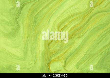 Abstract fluid art background bright green and olive colors. Liquid marble. Acrylic painting on canvas with lime pearl gradient. Watercolor backdrop w Stock Photo