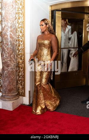 iman gold dress Iman on Fame, Starting Iman Cosmetics, & What's Next