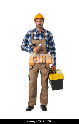 Handsome construction worker with tool-belt, full length portrait isolated on white background Stock Photo