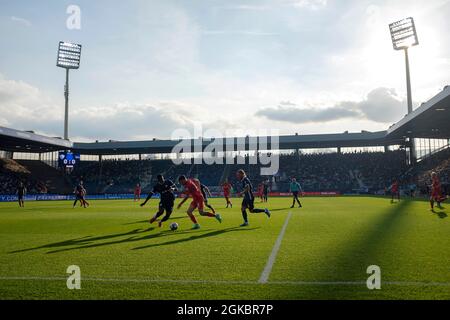 Feature, game scene, left to right Armel BELLA KOTCHAP (BO), Suat SERDAR (B), Konstantinos STAFYLIDIS (BO), action in Vonovia-Ruhrstadion, Soccer 1. Bundesliga, 4th matchday, VfL Bochum (BO) - Hertha BSC Berlin (B) 1: 3, on September 12th, 2021 in Bochum/Germany. #DFL regulations prohibit any use of photographs as image sequences and/or quasi-video # Â Stock Photo