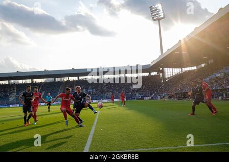 Feature, game scene, left to right Anthony LOSILLA (BO), Suat SERDAR (B), Marco RICHTER (B), Konstantinos STAFYLIDIS (BO), action in Vonovia-Ruhrstadion, soccer 1st Bundesliga, 4th matchday, VfL Bochum (BO ) - Hertha BSC Berlin (B) 1: 3, on September 12th, 2021 in Bochum/Germany. #DFL regulations prohibit any use of photographs as image sequences and/or quasi-video # Â Stock Photo