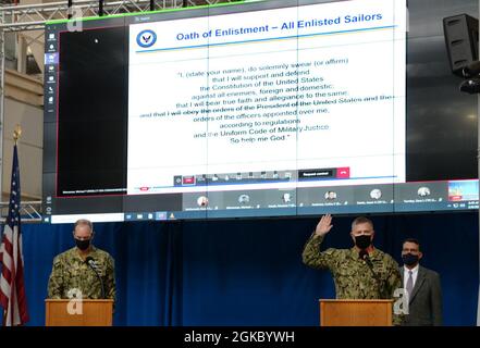 210308-N-UN340-003 SAN DIEGO (Mar. 8, 2021) Naval Information Warfare Systems Command (NAVWAR) Command Master Chief Thor Forseth, right, leads a reaffirmation of the oath of office for enlisted Sailors during a DoD-mandated extremism stand down, presented virtually from NAVWAR’s Old Town San Diego complex. Stock Photo