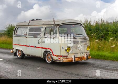 1971 70s seventies white VW Volkswagen Westfalia camper van,  en-route KLMC at ‘The Cars the Star Show” in Holker Hall & Gardens, Grange-over-Sands, UK Stock Photo