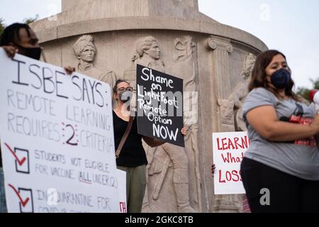 Chicago, USA. 13th Sep, 2021. Demonstrators calling for more safety and transparency during in-person learning in Chicago Public Schools protest near Mayor Lori Lightfoot's home in the Logan Square neighborhood in Chicago, IL on September 13, 2021. (Photo by Max Herman/Sipa USA) Credit: Sipa USA/Alamy Live News Stock Photo