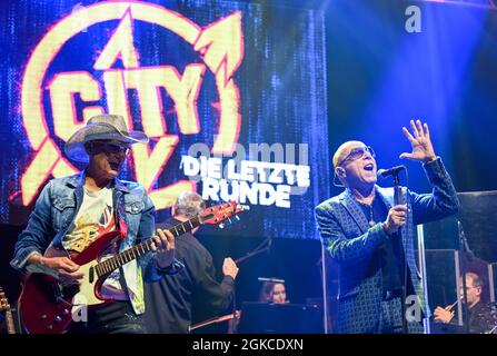 Berlin, Germany. 14th Sep, 2021. Musicians Fritz Puppel (l) and Toni Krahl from the band City during a performance at a press event for the band's 50th anniversary in 2022 at the Kesselhaus. The band wants to say goodbye to its fans with several live concerts at the end of next year. A new double album and a book are planned for the anniversary year. Credit: Jens Kalaene/dpa-Zentralbild/dpa/Alamy Live News Stock Photo