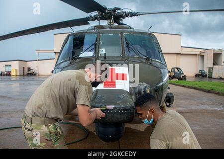 15T Blackhawk repairers assigned to 3rd Battalion, 25th Aviation Regiment, 25th Combat Aviation Brigade, 25th Infantry Division work daily to make sure maintenance gets done on the UH-60 Blackhawks on Wheeler Army Airfield, Hawaii. Stock Photo