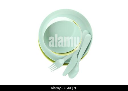 Colorful plastic dishware isolated on white background Stock Photo