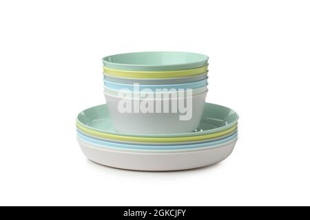 Colorful plastic dishware isolated on white background Stock Photo